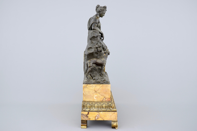 A Charles X patinated bronze and Siena marble striking mantel clock, ca. 1820-30, France